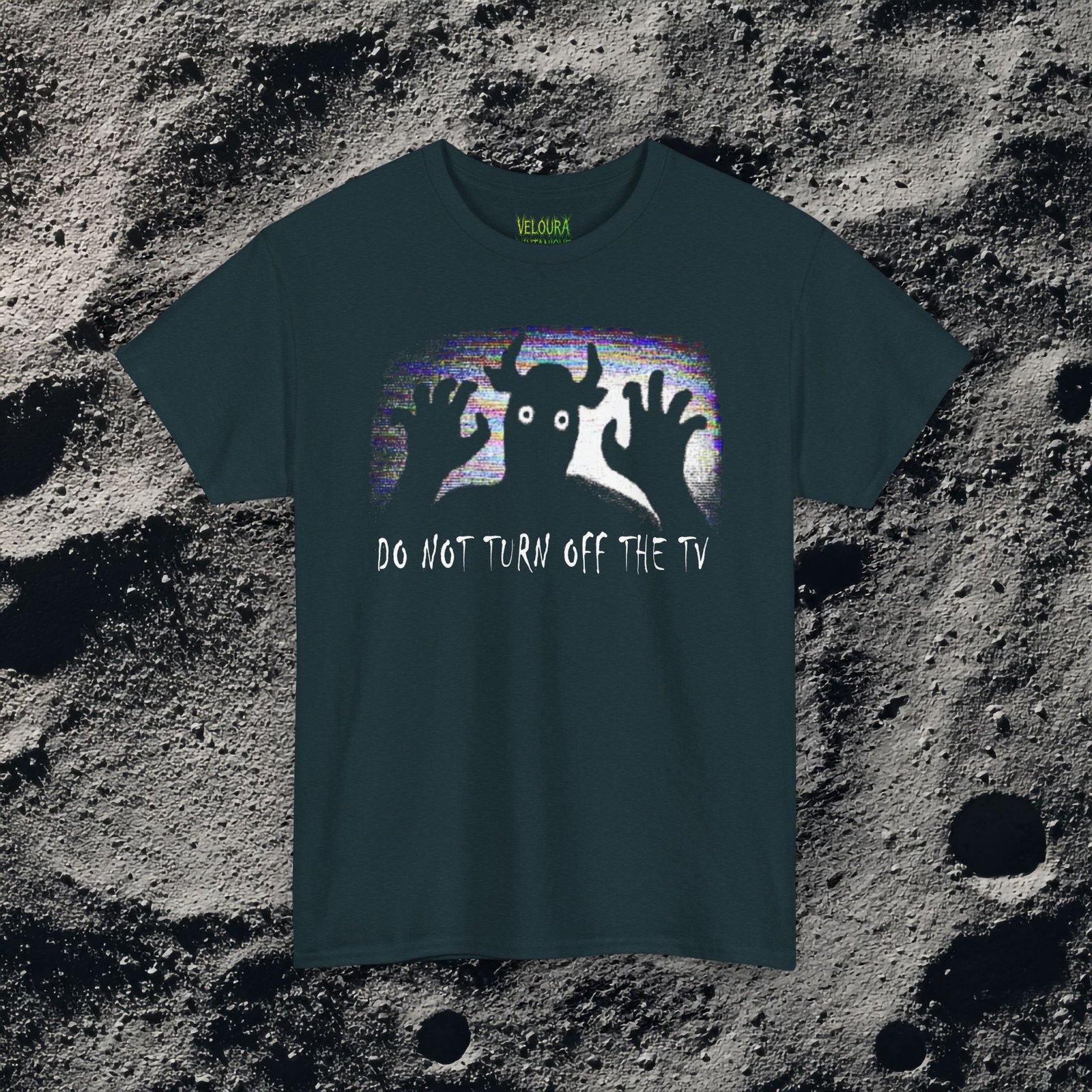 Scary analog horror t-shirt featuring a disturbing creature behind a static screen and watching directly from there. Beneath it reads "DO NOT TURN OFF THE TV"