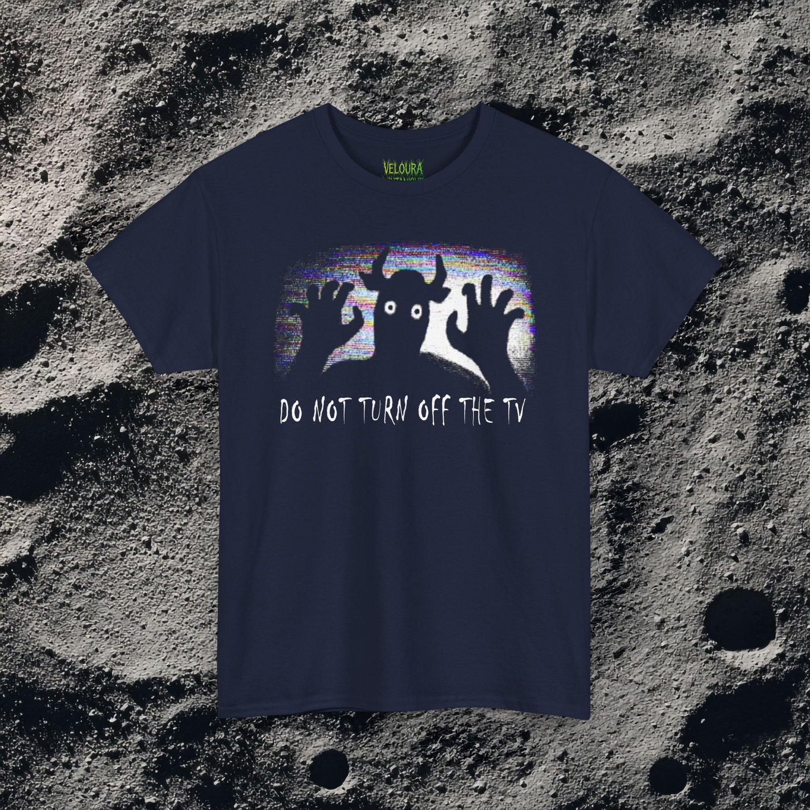 Scary analog horror t-shirt featuring a disturbing creature behind a static screen and watching directly from there. Beneath it reads "DO NOT TURN OFF THE TV"