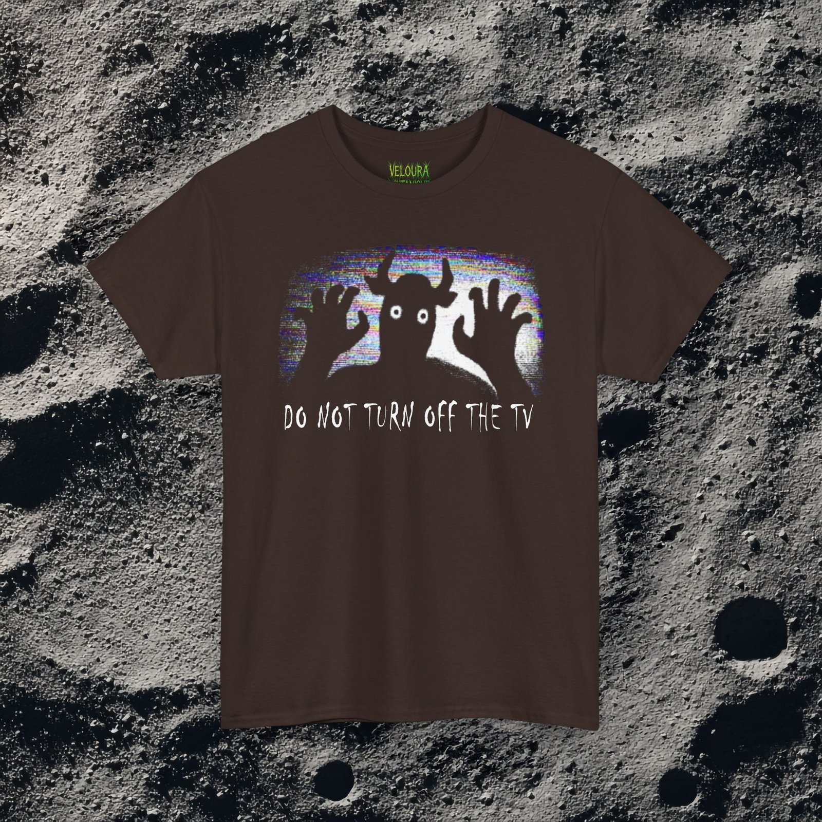 Scary analog horror t-shirt featuring a disturbing creature behind a static screen and watching directly from there. Beneath it reads "DO NOT TURN OFF THE TV"