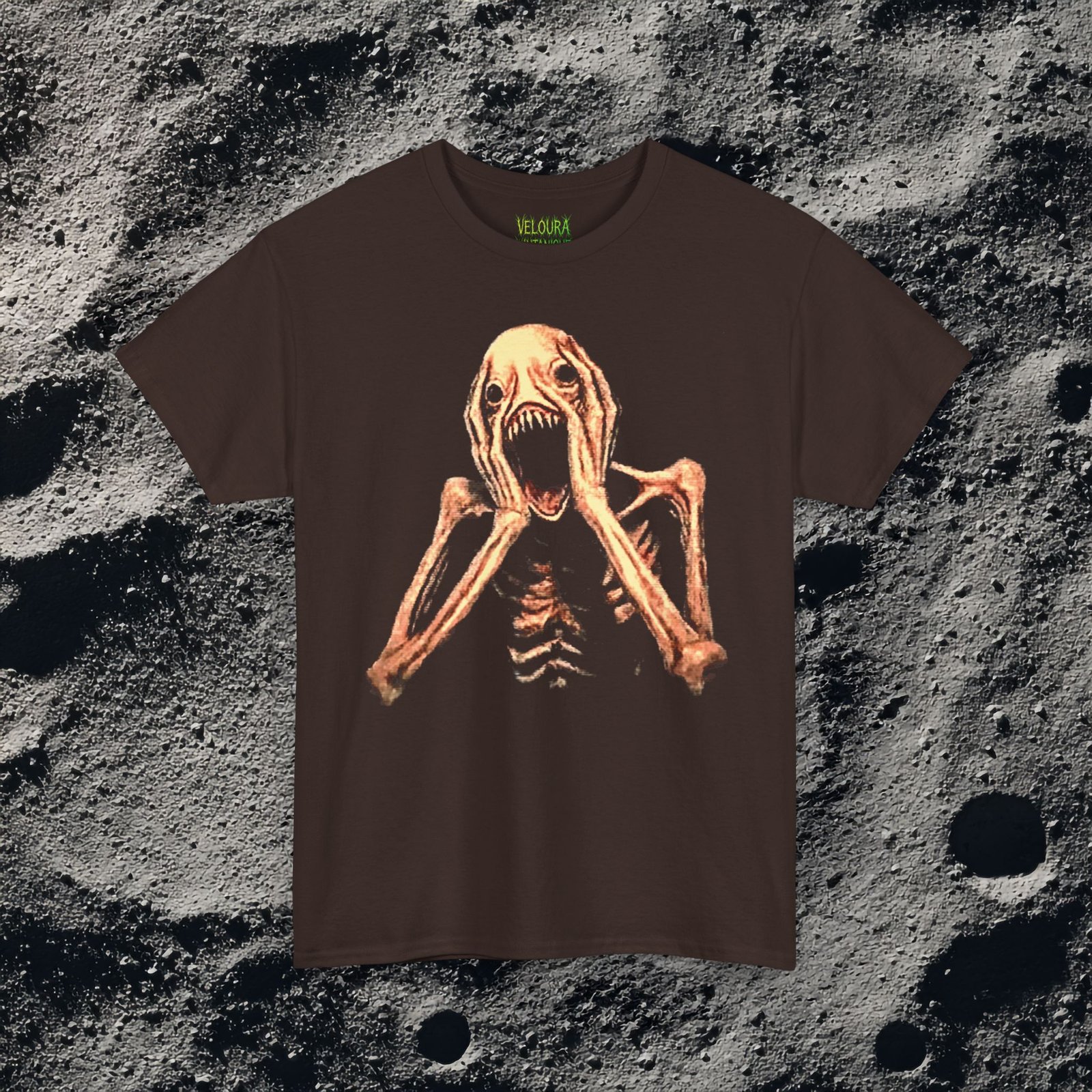This shirt features a grotesque skeletal creature with pale, stretched skin and exposed rib-like bones, its elongated arms raised toward its head in a pose of eternal screaming, with clawed hands framing a wide gaping mouth filled with sharp jagged teeth, empty black eye sockets above adding to its nightmarish expression, the design rendered in eerie detail against a solid black background, creating a disturbing and unsettling analog horror aesthetic.