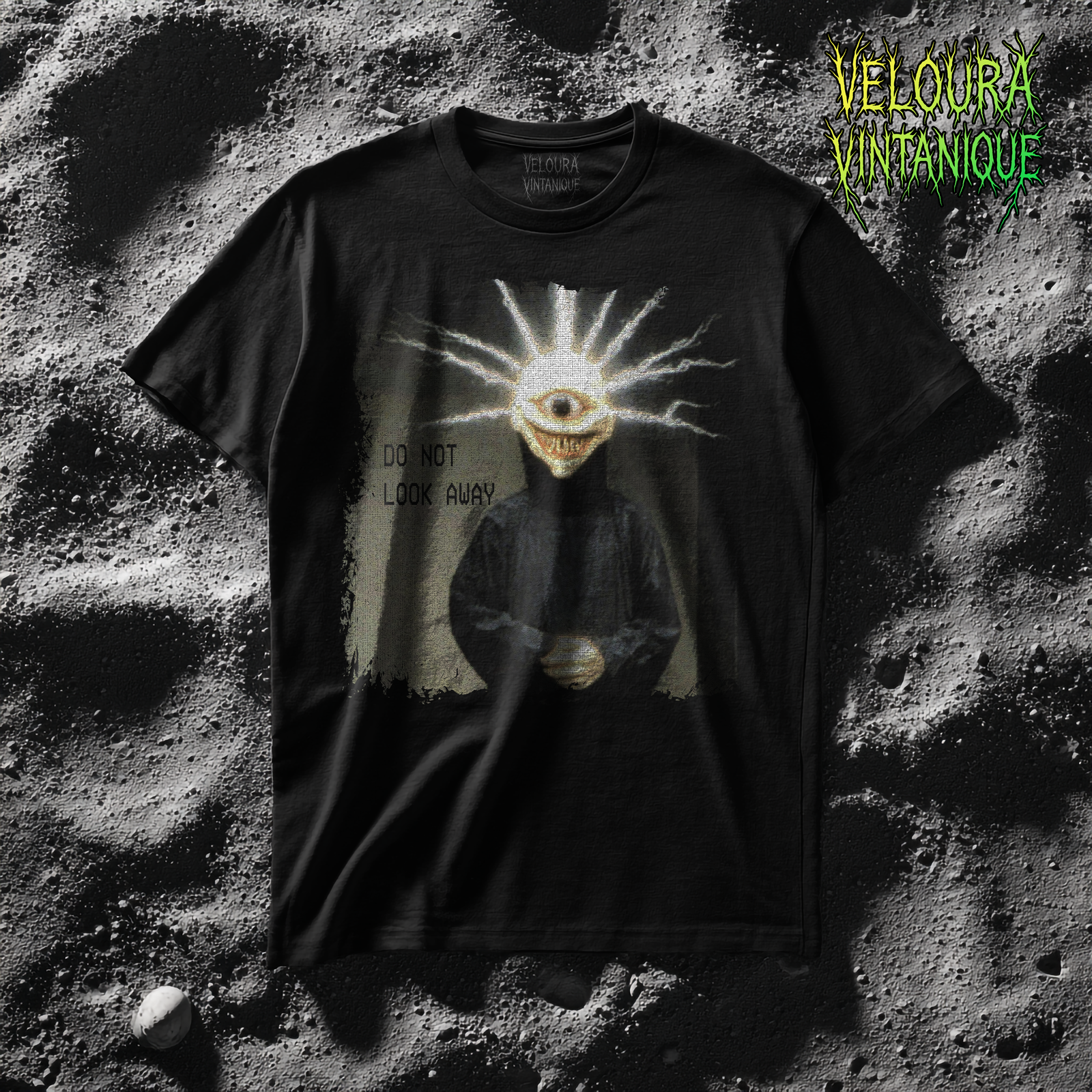 Analog horror shirt featuring a creature that appears when a television has been connected to a power source for too long, rare but possible. It is formed from electricity and emerges directly from the TV cord the moment it’s unplugged from the wall.