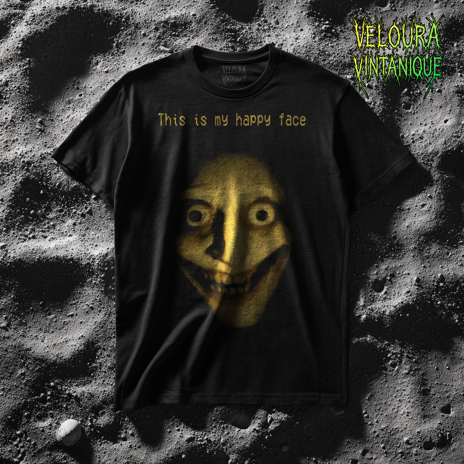 Creepy analog horror shirt. Yellow terrifying smiling face and it reads "This is my happy face" Good blend of humor and horror.