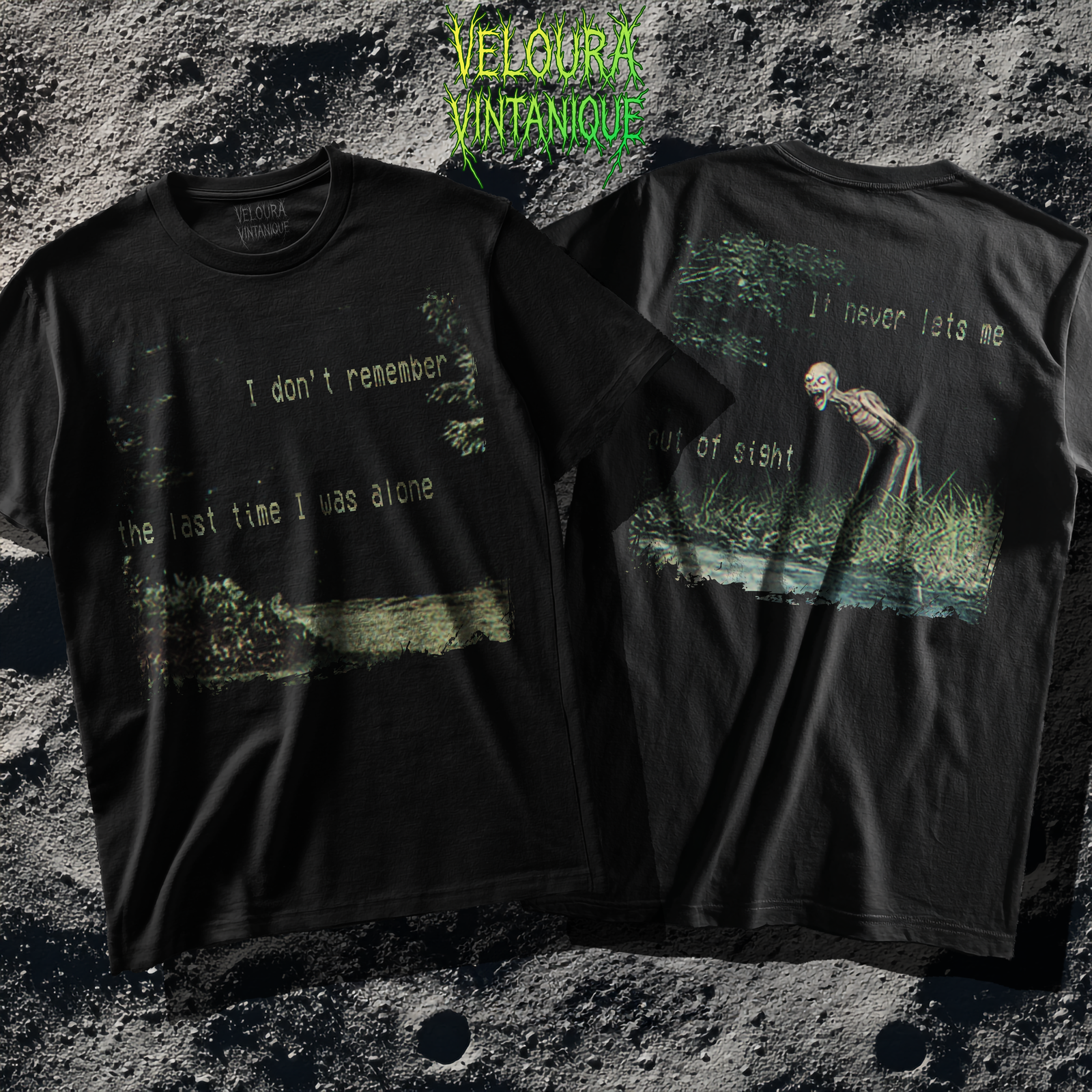 t-shirt features a haunting analog horror design, with the front displaying eerie VHS-style forest imagery and glitch effects alongside the unsettling text “I don’t remember the last time I was alone,” while the back shows a grainy night scene of tall grass and trees with a distorted, skeletal humanoid creature leaning forward and staring with a wide grin, accompanied by the chilling phrase “It never lets me out of sight,” creating a disturbing and atmospheric look that captures the feeling of being stalked and never truly alone.