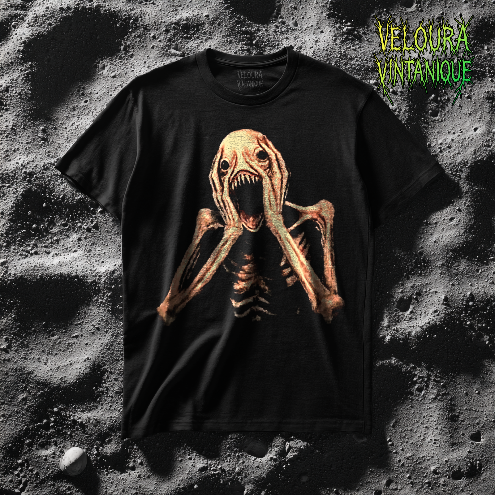 This shirt features a grotesque skeletal creature with pale, stretched skin and exposed rib-like bones, its elongated arms raised toward its head in a pose of eternal screaming, with clawed hands framing a wide gaping mouth filled with sharp jagged teeth, empty black eye sockets above adding to its nightmarish expression, the design rendered in eerie detail against a solid black background, creating a disturbing and unsettling analog horror aesthetic.