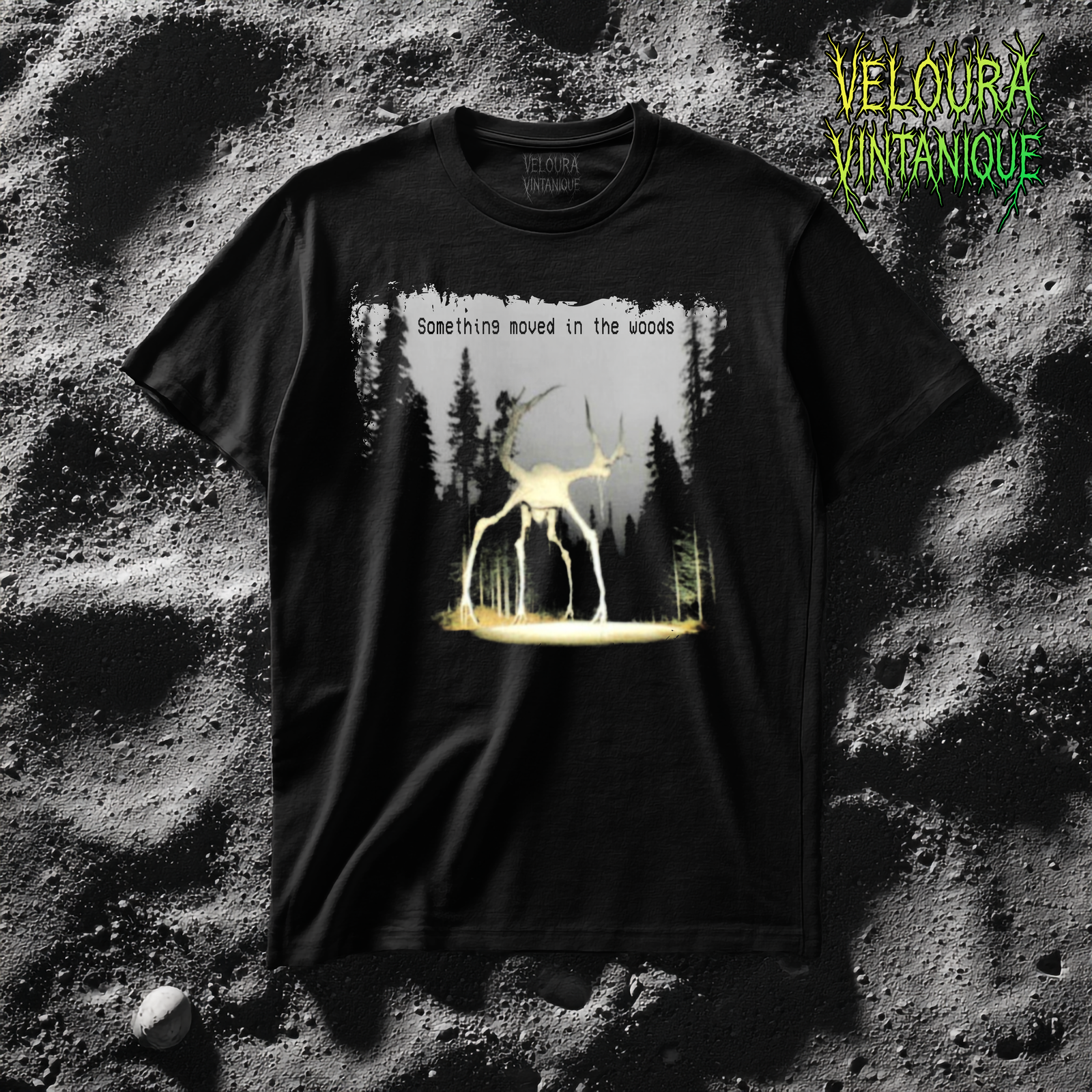 This analog horror inspired shirt features a chilling creature standing in the woods, illuminated by eerie headlights. The text “Something moved in the woods” enhances the unsettling atmosphere, making it perfect for horror fans, cryptid lovers, and those drawn to creepy designs. A unique and terrifying graphic tee for Halloween, horror movie nights, or anyone who loves analog horror fashion. Dark, mysterious, and surreal – a must-have for your eerie collection.