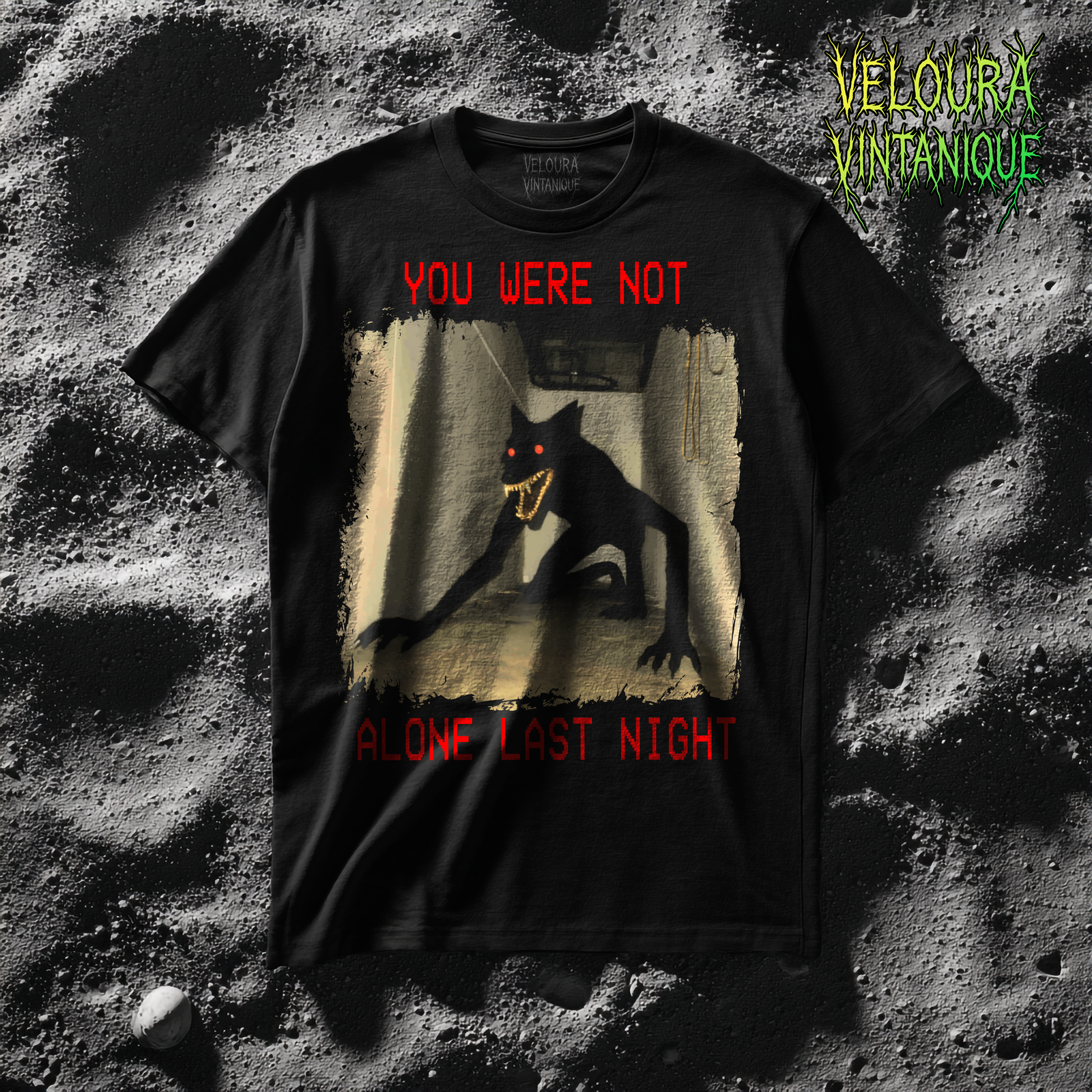you were not alone last night analog horror t-shirt. The print features a creepy design of a wolf like black creature with scary red eyes and sharp teeth. Very uncanny t-shirt. Great for analog horror fans and horror fans in general.