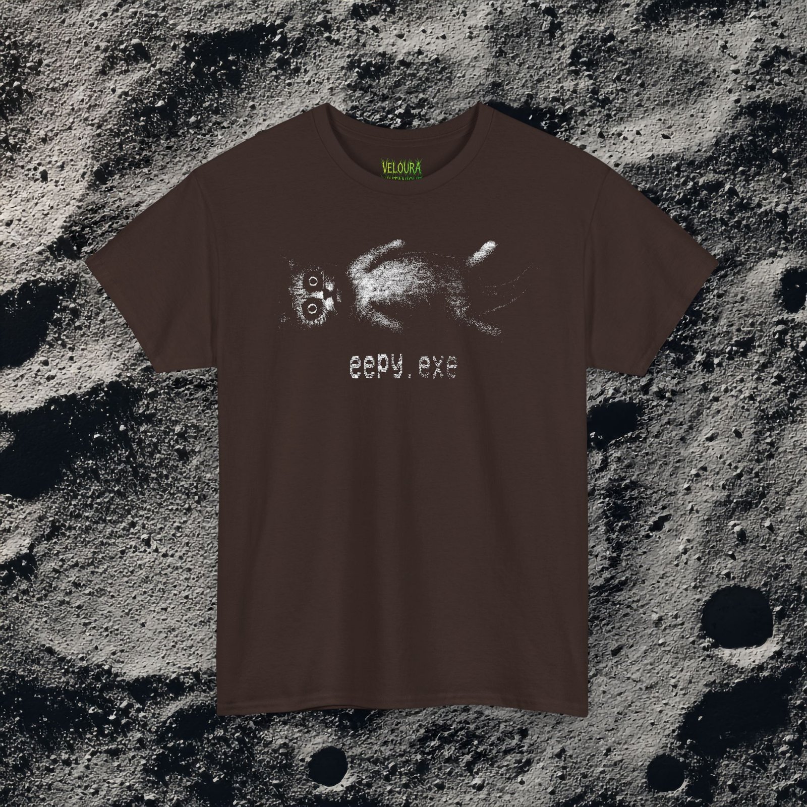 This creepy “eepy.exe” T-shirt features a distorted glitch-style cat lying on its back with bright, unsettling eyes and a fuzzy static texture. The artwork looks like corrupted VHS footage or a broken video file, giving the shirt a unique creepycore, weirdcore and digital-horror aesthetic. Perfect for fans of strange pets, glitch art, catcore, and unsettling retro graphics. Printed in high quality for crisp details on your chosen shirt color.