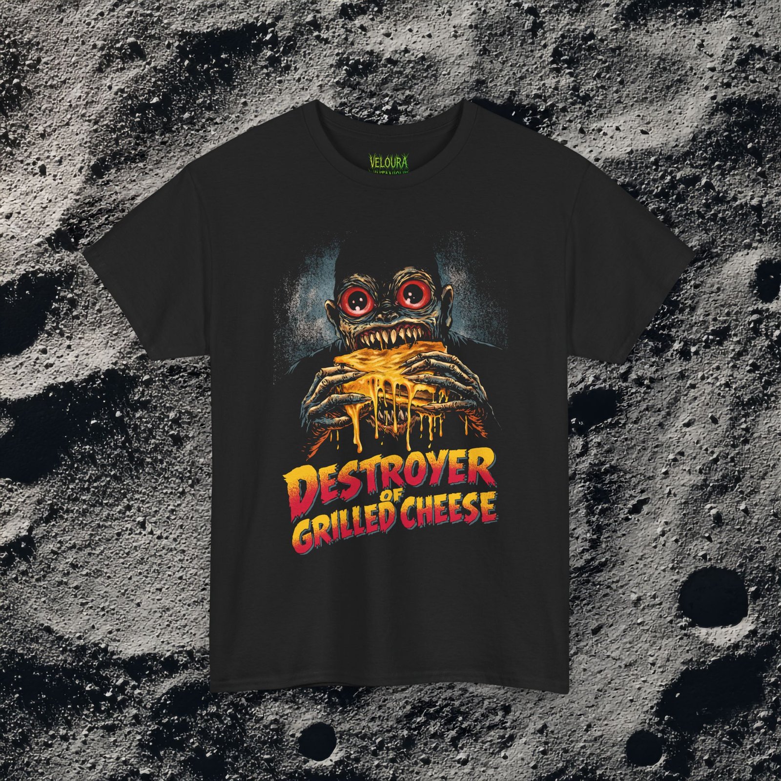 This bold and hilarious T-shirt features a monstrous creature with glowing red eyes devouring a dripping, melty grilled cheese sandwich, paired with the phrase βDestroyer of Grilled Cheese.β The design blends horror aesthetics with dark humor, making it perfect for food lovers who enjoy edgy, meme-style graphics. With its vivid colors, exaggerated expression, and gooey cheese details, this shirt instantly grabs attention and sparks laughs. Ideal for fans of quirky humor, creepy art, late-night snacks, and unapologetic comfort food obsession.