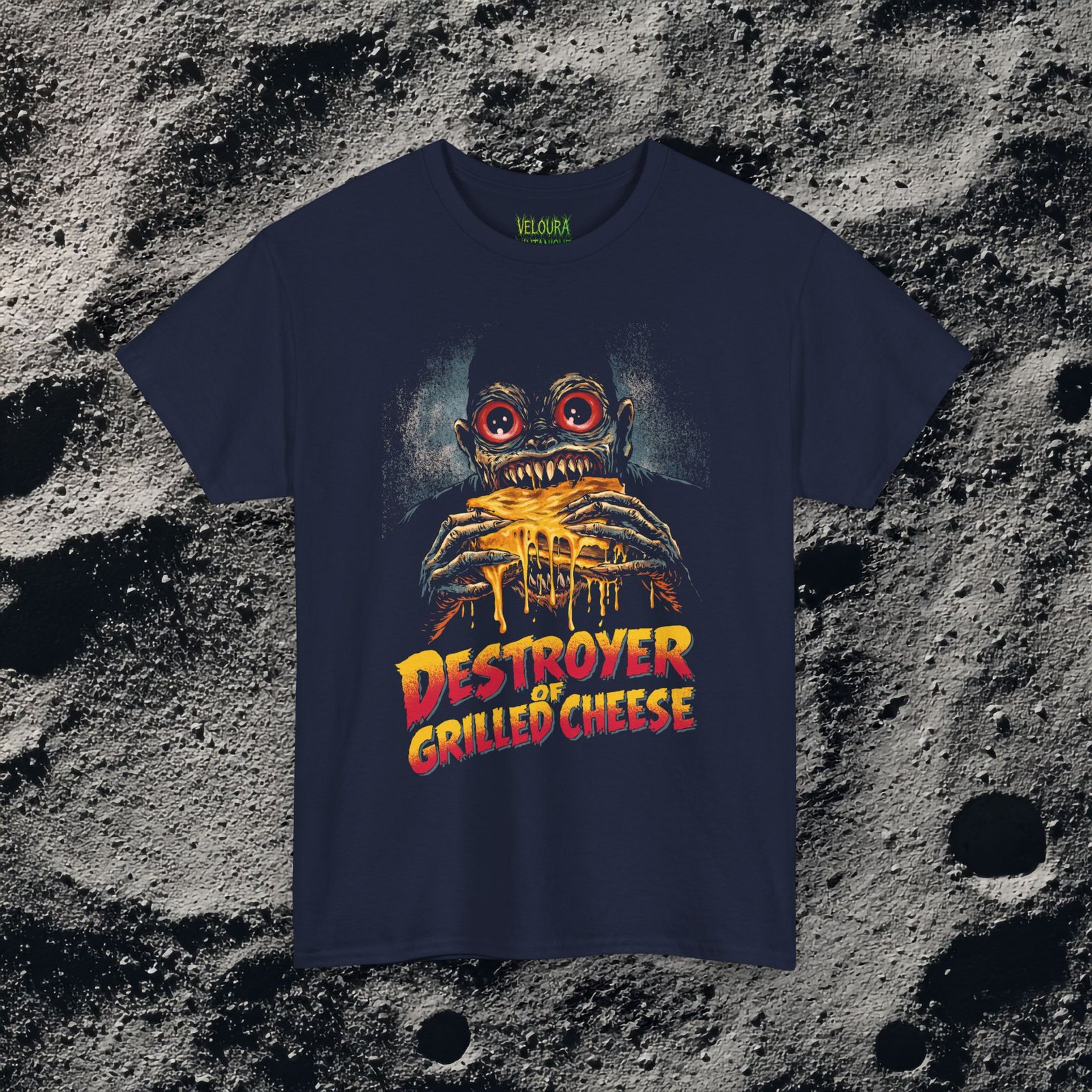 This bold and hilarious T-shirt features a monstrous creature with glowing red eyes devouring a dripping, melty grilled cheese sandwich, paired with the phrase βDestroyer of Grilled Cheese.β The design blends horror aesthetics with dark humor, making it perfect for food lovers who enjoy edgy, meme-style graphics. With its vivid colors, exaggerated expression, and gooey cheese details, this shirt instantly grabs attention and sparks laughs. Ideal for fans of quirky humor, creepy art, late-night snacks, and unapologetic comfort food obsession.