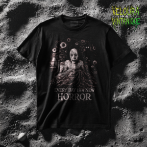 This T-shirt features a haunting analog horror illustration of a pale, wide-eyed figure sitting upright in bed, surrounded by watching eyes emerging from the darkness. The distressed, grainy texture gives the artwork a vintage VHS and creepypasta feel. The phrase “Every Day Is a New Horror” completes the unsettling scene, capturing the dread of sleepless nights and intrusive thoughts. Designed for fans of psychological horror, liminal spaces, and unsettling art, this shirt delivers quiet terror rather than loud shock.