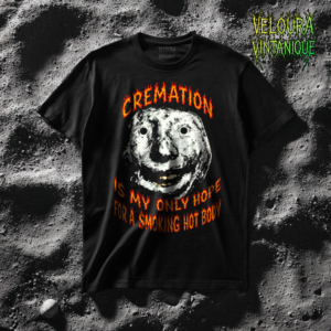 This dark humor T-shirt features a disturbing surreal face paired with flaming typography reading “Cremation Is My Only Hope for a Smoking Hot Body.” The fiery lettering and gritty horror-style artwork create a bold gothic aesthetic. Designed for fans of edgy humor, alternative fashion, and dark meme culture, this graphic tee blends horror art with sarcastic self-deprecating humor. A perfect statement piece for those who appreciate twisted comedy and bold streetwear.