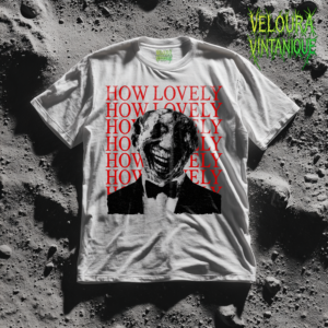 This unsettling horror T-shirt features a distorted, sinister smiling figure in a vintage suit, rendered in gritty black-and-white halftone texture. Behind the character, the phrase “HOW LOVELY” repeats in bold red typography, creating a disturbing contrast between elegance and madness. The design blends analog horror, psychological thriller energy, and gothic streetwear aesthetics. Perfect for fans of creepy art, liminal horror vibes, and bold statement graphic tees.