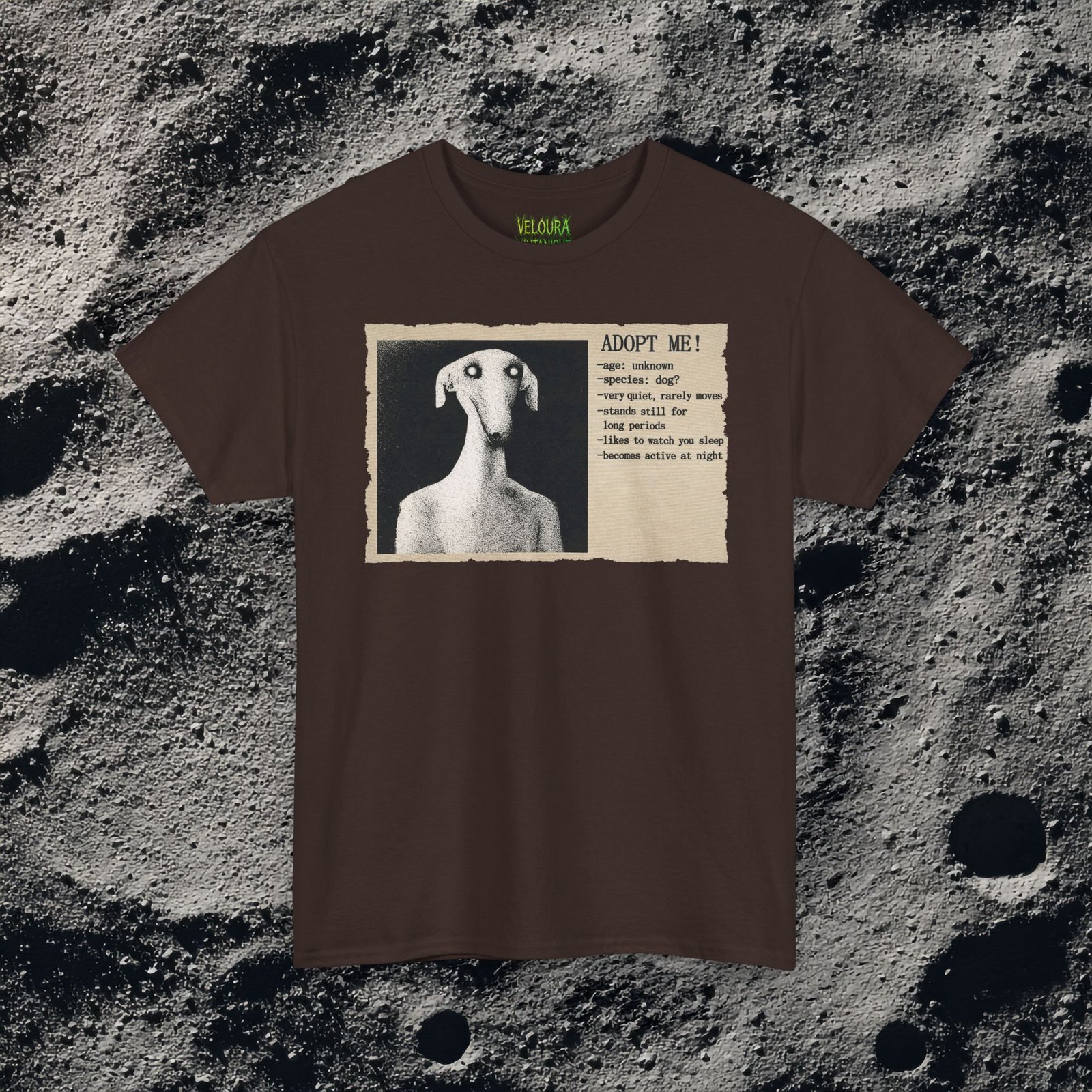 This eerie analog horror-inspired design features a distorted humanoid dog figure with glowing eyes, presented in a grainy black-and-white style. The artwork mimics an old, unsettling adoption poster with the headline “ADOPT ME!” followed by disturbing details like “age: unknown,” “species: dog?” and “likes to watch you sleep.” The textured paper background and vintage print effect enhance the unsettling atmosphere, making this design perfect for fans of analog horror, liminal spaces, and creepy surreal art.