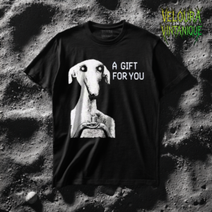 This unsettling horror T-shirt features a strange, eerie dog-like creature with hollow eyes and an unnatural expression, holding a small gift box in its hands. The grainy black-and-white texture creates a disturbing analog horror aesthetic reminiscent of cursed TV broadcasts and creepypasta imagery. The phrase “A GIFT FOR YOU” appears beside the figure in glitch-style typography, adding a mysterious and ominous tone. Perfect for fans of analog horror, creepy art, and dark streetwear.